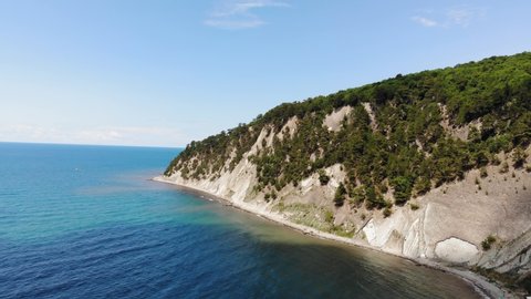 Flight over the bay in the blue sea. Beautiful landscape of the rocky shore. Inal Bay on the Black Sea. Summer. Aerial Video Filming