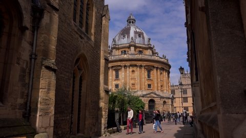 Oxford, Oxfordshire / England - August 22 2019: The buildings in Oxford city are built with a local honey coloured lime stone which has become a defining feature of this academic city UK 4K.