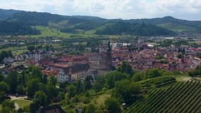 Aerial view of the old town of Gengenbach in Germany  on a sunny day in summer. Zoom in on the old town.
