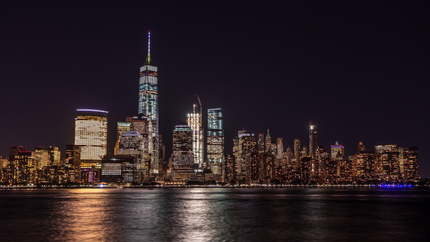 New York, USA - September 22, 2016 : Lower Manhattan, Wall Street view from New Jersey time lapse at night | Shutterstock HD Video #1036737470