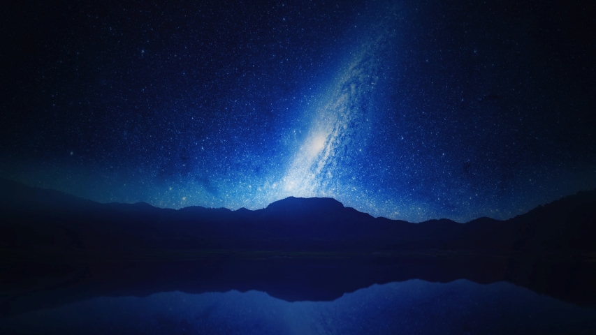 Cinemagraph of stars in motion over mountain landscape at night