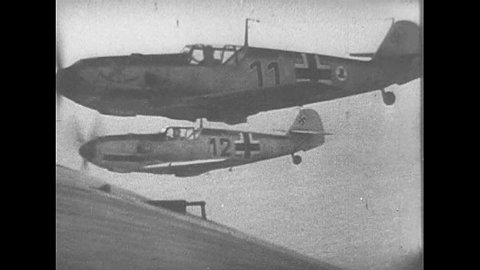 CIRCA 1940s - The Royal Air Force takes off and dogfights with Nazi warplanes in the skies above the English Channel, during World War 2, in 1940.