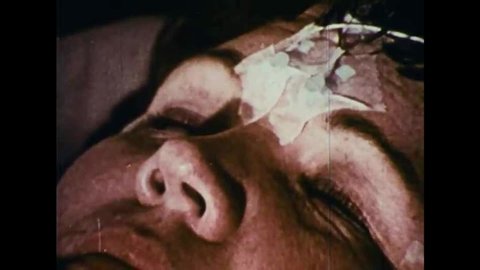 CIRCA 1970s - Researchers measure brain waves of people while sleeping in the 1970s
