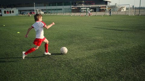 Little Football Player Is Kicking Stock Footage Video 100 Royalty Free Shutterstock