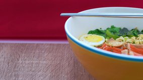 4K video of instant noodle with egg in the bowl, Thailand.