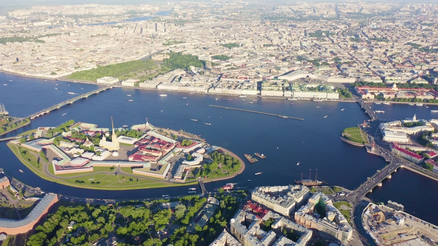 Saint-Petersburg, Russia. Hare Island and Peter-Paul Fortress with Trinity Bridge and Spit of Vasilievsky Island on serene Neva River. Summer day. Aerial view