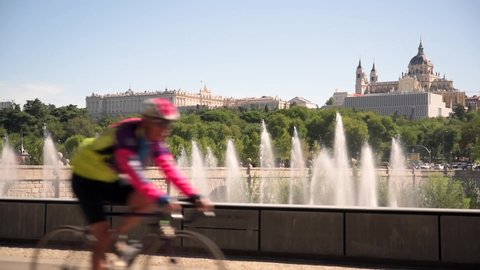 The Royal Palace of Madrid and the Almudena Cathedral seen from the Madrid Rio bike path