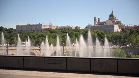 View of the Royal Palace and the Almudena Cathedral from the Segovia bridge in Madrid