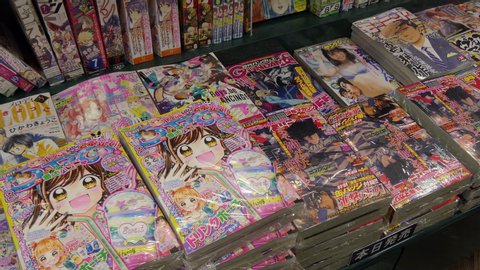 TOKYO / JAPAN - JULY 2019: Japanese shop with anime magazines, store selling comics and manga books in shopping mall in Tokyo, Japan, Asia