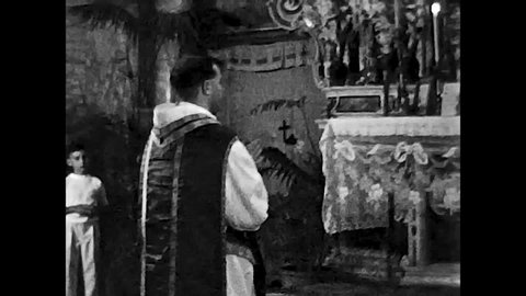 Naples, Italy, 1955 - A priest celebrates Mass on the altar