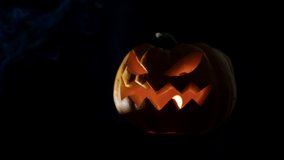 Halloween pumpkin Jack o lantern with candle lights at night. - Powered by Shutterstock - Get 15% off with code: PIKWIZARD15