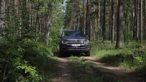 Adazi, LV - AUG 25, 2017: Volkswagen Amarok at the woods