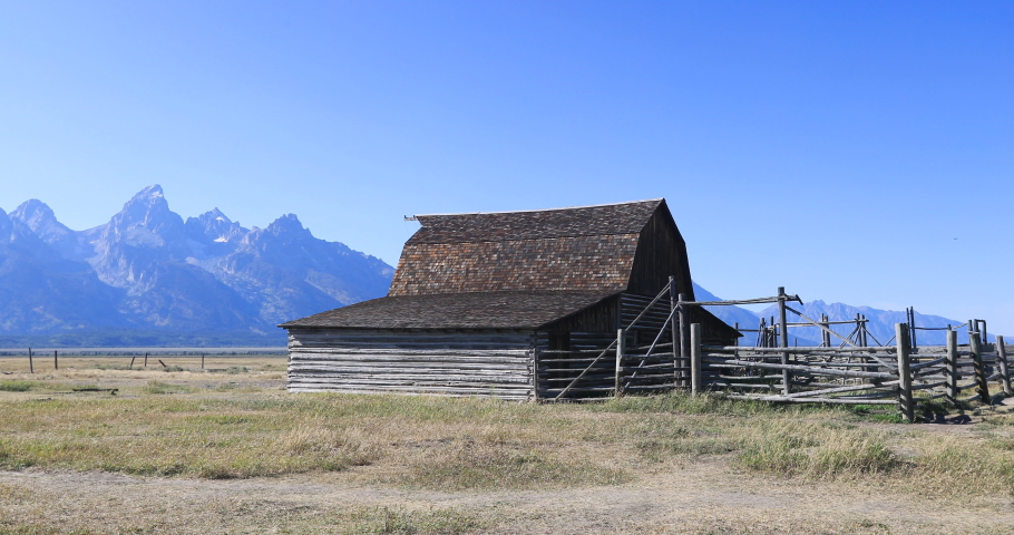 Grand Teton National Park mountain Mormon Row historic barn. Destination for mountaineering, hiking, fishing and recreation. Over 2.5 million visitors a year.