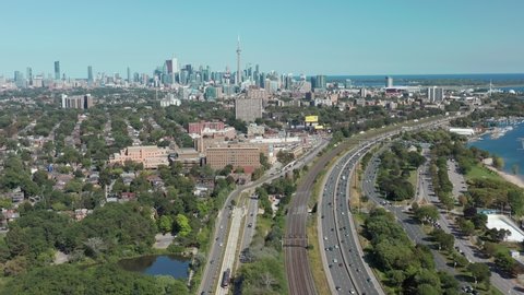 Aerial Establishing Shot of the Gardiner Expressway Leading into Downtown Toronto. 