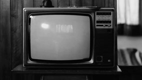 A Hurricane Seen from Space on a Vintage Television Set. Black and White Tone. Elements of this Video furnished by NASA.  