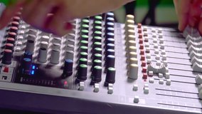 Mixer control board adjusted by sound engineer - Powered by Shutterstock - Get 15% off with code: PIKWIZARD15