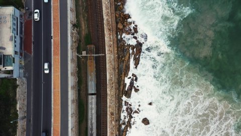 Aerial view of a train running along the coast in South Africa