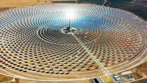 Modern solar power station with tower in aerial view, Concentrated solar power tower, solar farm center