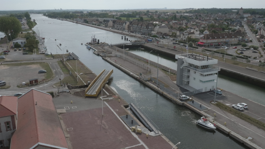 Water gate during closing, top view at the port of Ouistreham, commune of the department of Calvados in the region of Basse-Normandie in north-west France. Material 4k, timelaps.