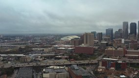 This video is about an aerial view of downtown Houston on a gloomy and rainy day. This video was filmed in 4k for best image quality.