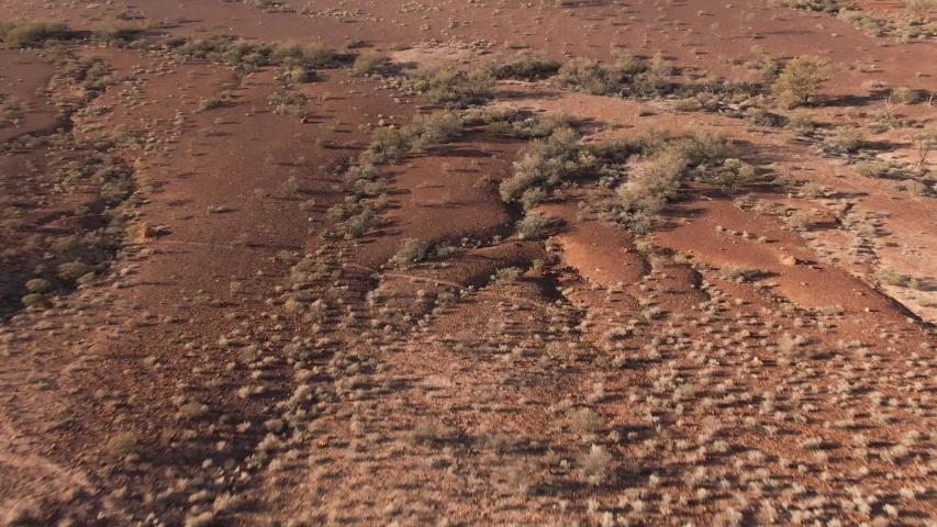 Aerial: Inspiring footage of the Breakaways, tourism scenic spot outside of Coober Pedy in the South Australian Outback.