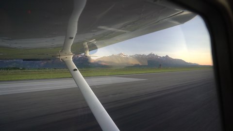 Inside A Light Aircraft During Takeoff With Grand Teton Mountain Ranges, Wyoming