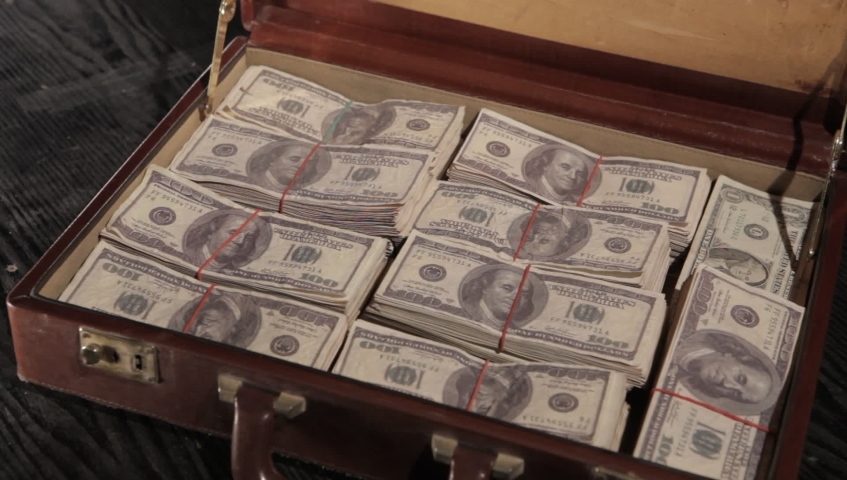 maleta llena de billetes 100 dólares: video de stock (totalmente libre de  regalías) 2154095 | Shutterstock