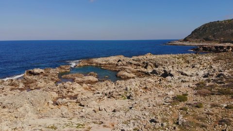 Drone footage above the rocky coastline of Crete between Rethymno and Petres