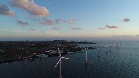 Offshore landscape of western Jeju island, aerial view of wind farm, South Korea, Asia