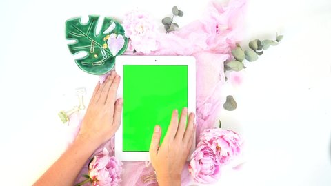Creative wedding planner composition mock up with green screen, pink blanket, flowers on white background. Flat lay, top view stylish art concept. วิดีโอสต็อก
