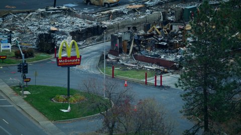 California USA - February 2019: Aerial view of fast food sign amongst the debris and destruction the aftermath of Campfire wildfire in Paradise RED WEAPON
