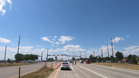 Greeley , CO / United States - 08 22 2019: Hyperlapse of an accident at an intersection with cops standing around.