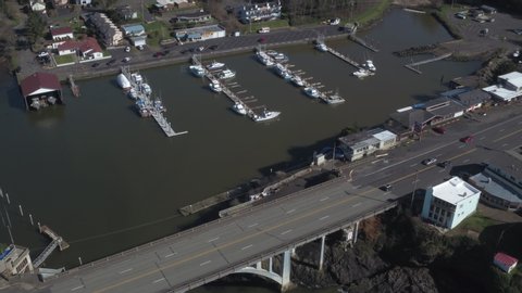 Aerial of a boat dock in Lincoln City, Oregon. 4K