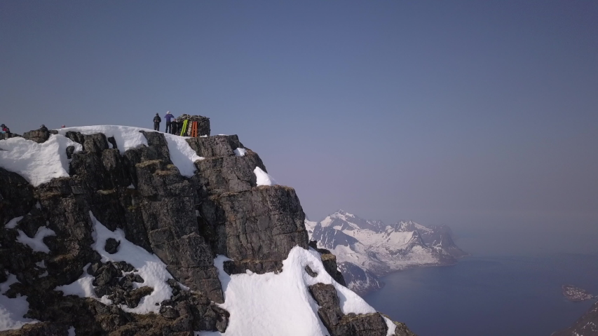 Drone aerial video from the Keipen peak at Senja Island in Spring season with snow.
