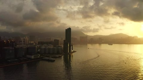 Aerial View drone 4k footage Of Modern Skyscrapers In Hong Kong City. buildings in Hong Kong city on sunrise.