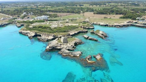Aerial view, flight at Tower and bay of Roca Vecchia (Torre di Maradico), archaeological sites, Brindisi region, Apulia Italy