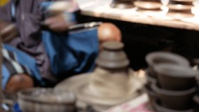 Blurry people traditional pottery molding. Pottery factory Ko Kret Nonthaburi Thailand - Powered by Shutterstock - Get 15% off with code: PIKWIZARD15