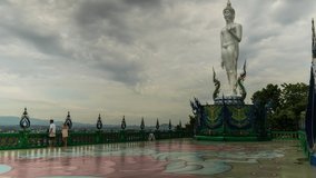 Timelapse of temple and big Buddha statue footage video 4k. Sriracha Thailand. Buddha statue in Wat khao phra kru temple located in Sriracha city Chonburi, Thailand