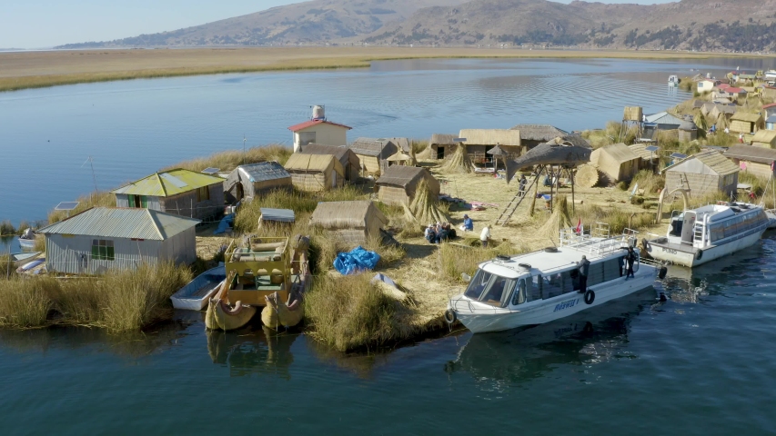 Small floating island of Uros village in Lake Titicaca, Puno, Peru
