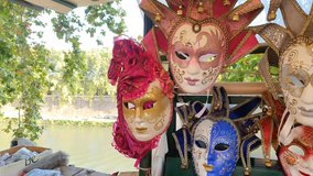 Selling of Colored Venice Masks on a Stall on Blur Background