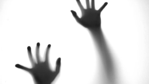 Abstract and spooky defocused hand
