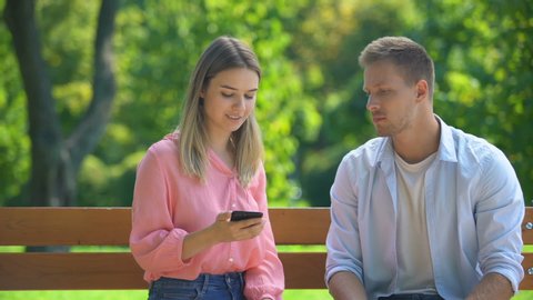 Girlfriend scolding guy for chatting with other women, correspondence on phone