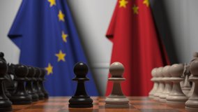 Flags of the EU and China behind chess board. The first pawn moves in the beginning of the game. Political rivalry conceptual 3D animation - Powered by Shutterstock - Get 15% off with code: PIKWIZARD15