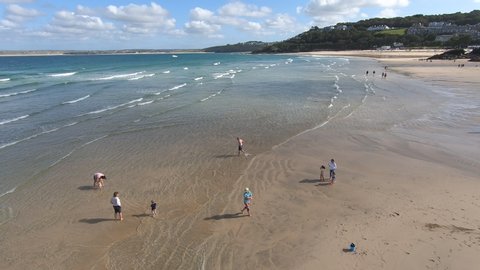 Saint Ive, Cornwall / England - 09/05/2019: People in the beach of St. Ives