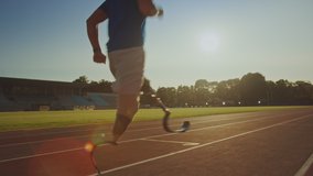 Athletic Disabled Fit Man with Prosthetic Running Blades is Training on a Outdoors Stadium on a Sunny Afternoon. Amputee Runner Jogging on a Stadium Track. Motivational Sports Footage. Tracking Shot. - Powered by Shutterstock - Get 15% off with code: PIKWIZARD15