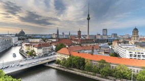 Berlin skyline aerial view from day to night time lapse video in 4K, Germany city view of tv tower bridge and rive. Berlin mitte view.