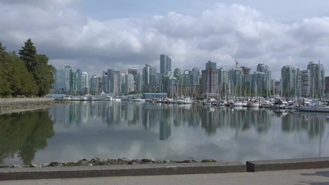 August17,2019:Vanvouver,Canada: Landscape view of the city center of Vancouver in Canada with many yachts in Vancouver Harbour-View from Stanley Park