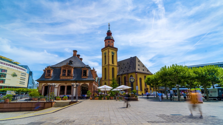 The Hauptwache (Main Guardroom) is a central point of Frankfurt am Main Germany, time lapse, hyperlapse video. Most popular square in Frankfurt city. St. Catherine