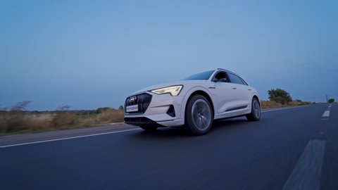 VINNITSA, UKRAINE - September 2019: Audi e tron profile view. Audi e tron, a fully electric car on highway