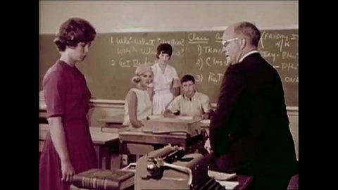 CIRCA 1963 A school newspaper editor asks and her advisor argue about printing a picture of two high school boys fighting in the student newspaper.